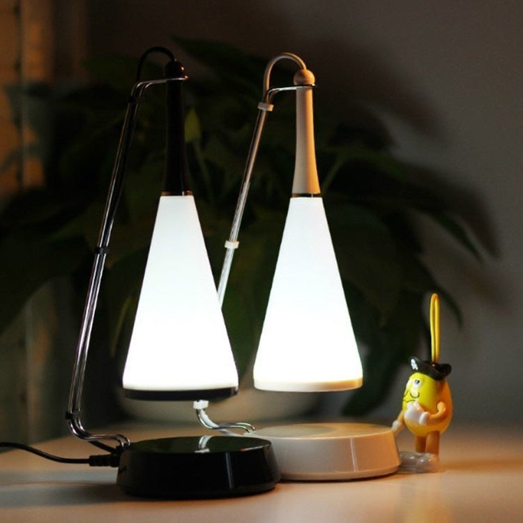 Pair of mini LED speaker lamps with white shades, warm glow, and black bases