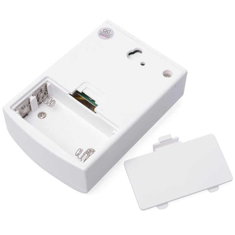 VOYE wireless door chime receiver with open battery cover and internal electronics