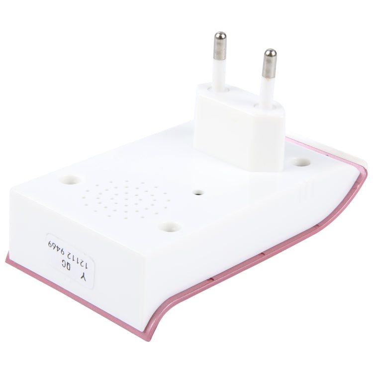 White wireless door chime front with speaker grill and two metal antenna plugs