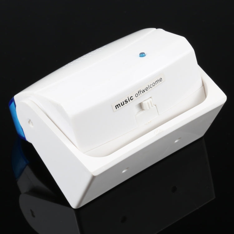 Wireless doorbell chime, white front panel with small blue indicator light