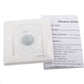 White wall motion sensor switch with circular lens, with specifications label behind