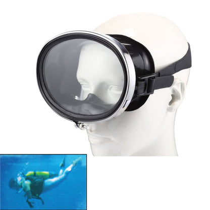 Black wide-view dive goggles with clear face shield and adjustable strap on head
