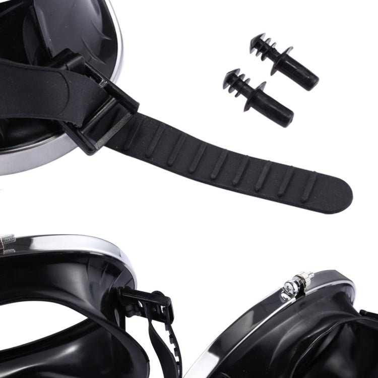Close-up of black dive goggle strap with buckle and mounting screws
