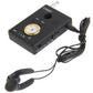 Black CX007 detector with speaker grille, gold timer dial, headphones jack, and antenna