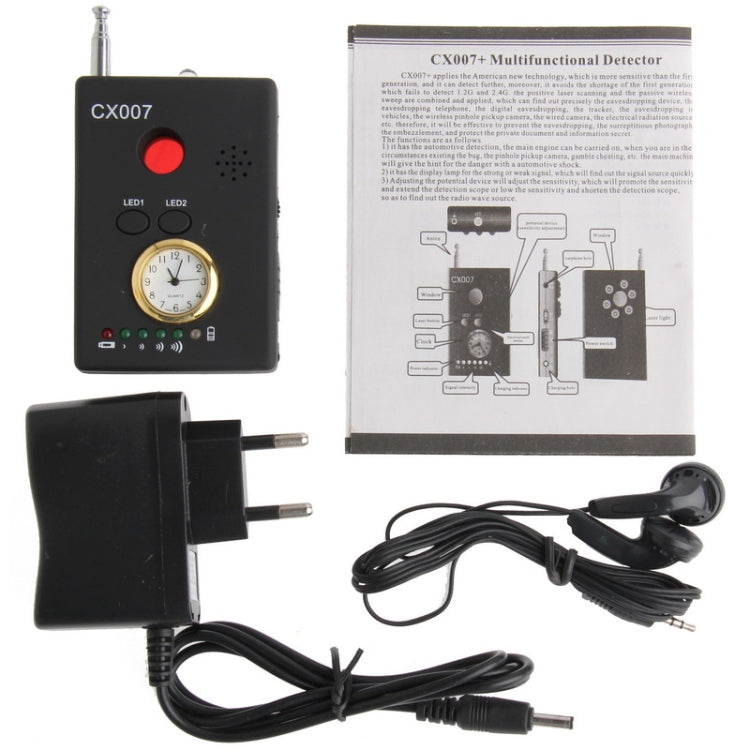 Black CX007 detector with wall plug, cables, and product instruction diagram sheet