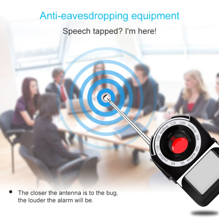 Wireless signal detector with antenna and dial held near person indoors