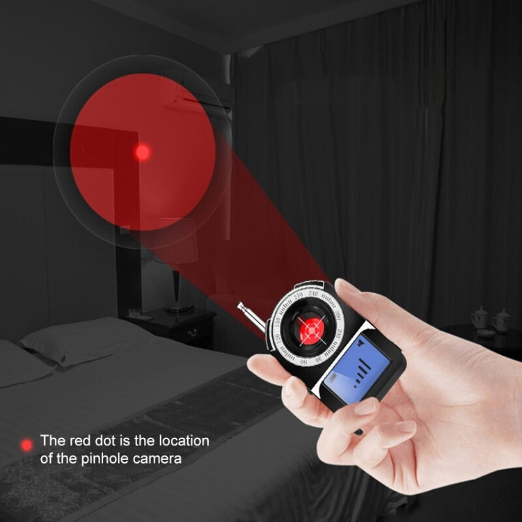 Wireless signal detector with hand-held dial and screen, red alert light shown
