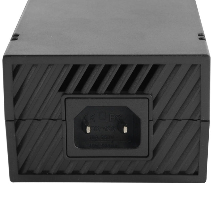 Black AC adapter bottom with venting and wall plug input
