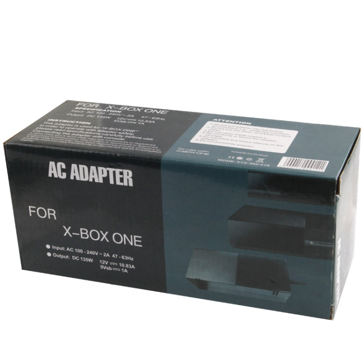 AC adapter retail box labeled for Xbox One with power input/output specs