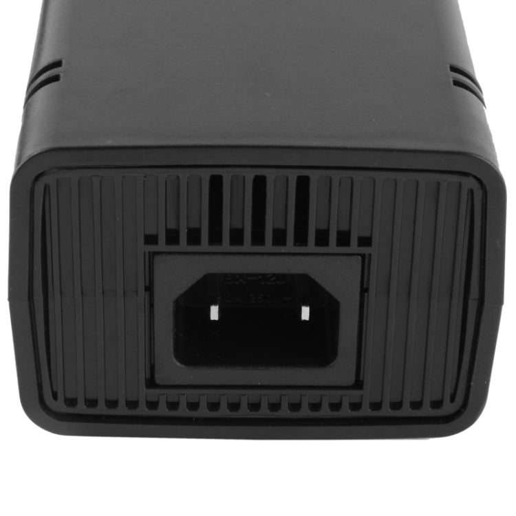 AC power adapter front panel with vent grilles and connector opening
