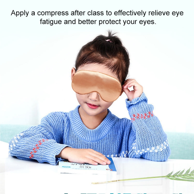 Child wearing a warm silk heated sleep eye mask over closed eyes