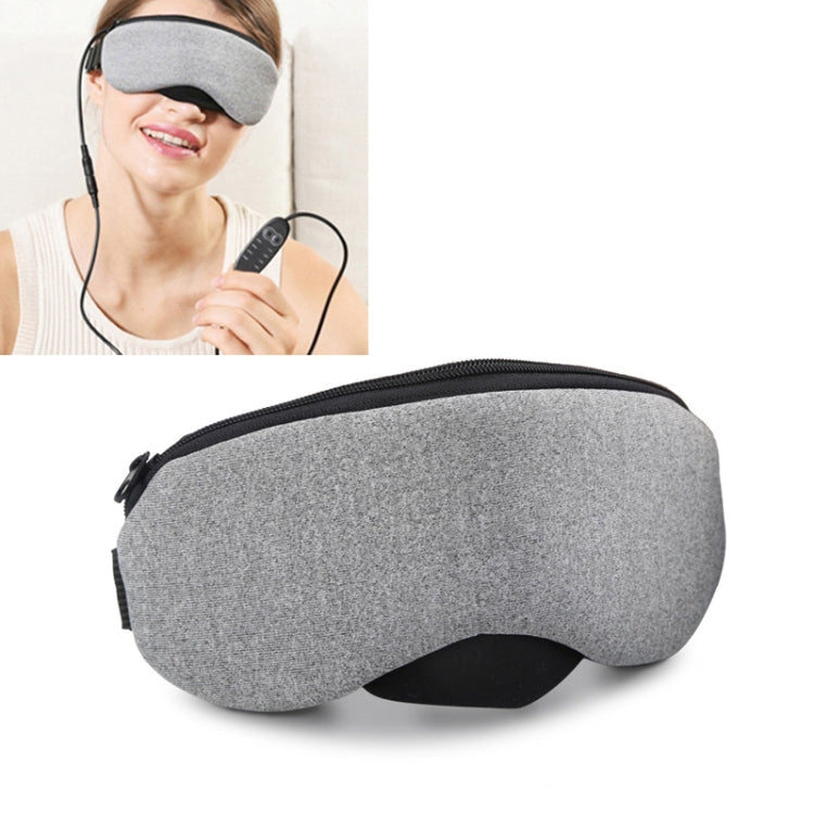 Grey heated sleep eye mask with wired controller, worn on the face