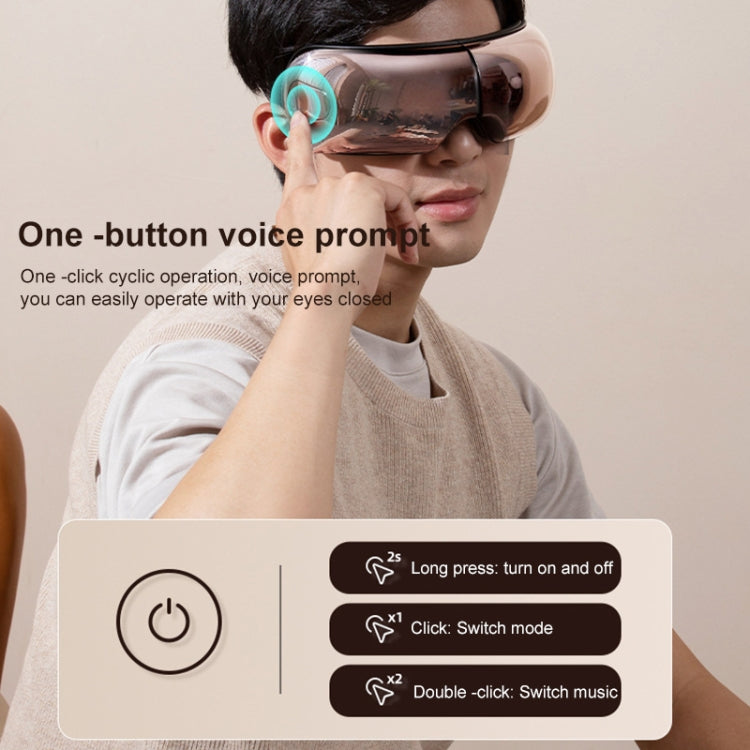 Eye massager worn on closed eyes with dark glossy visor and side strap.