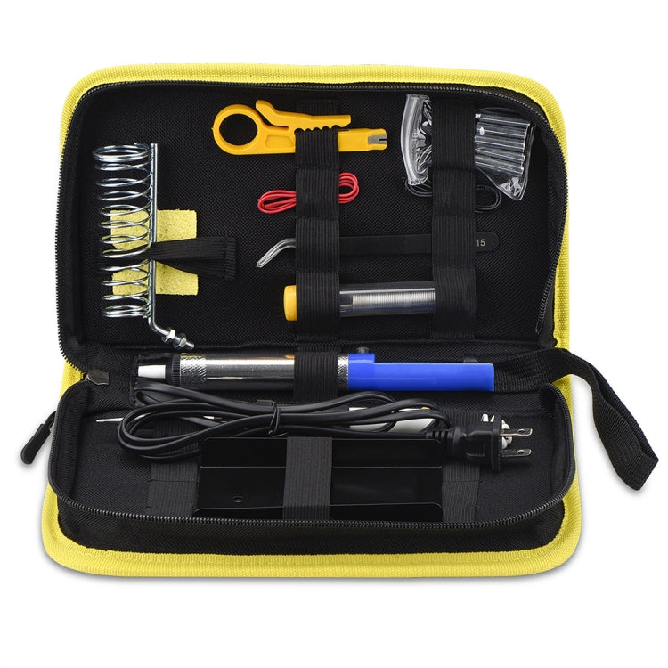 Soldering iron kit case open with yellow interior, showing tools, iron, and spare tips