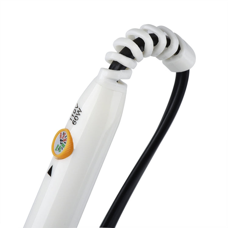 Soldering iron cable end with white strain relief and coiled spring section