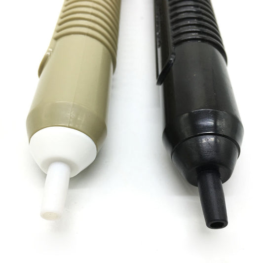 Solder suction pump nozzle ends, light grey white tip and dark black tip