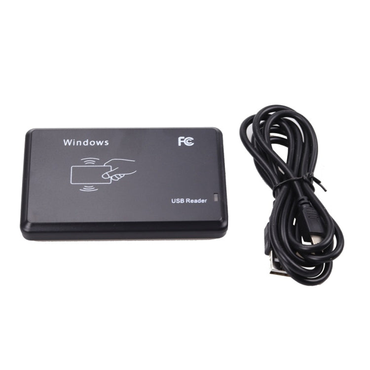 Black USB RFID card reader with coiled USB cable, compact rectangular design