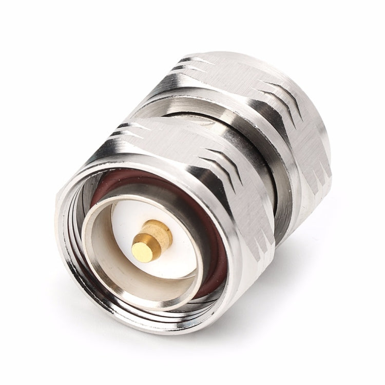 Silver 7/16 DIN male RF coaxial adapter with gold center contact and red gasket seal