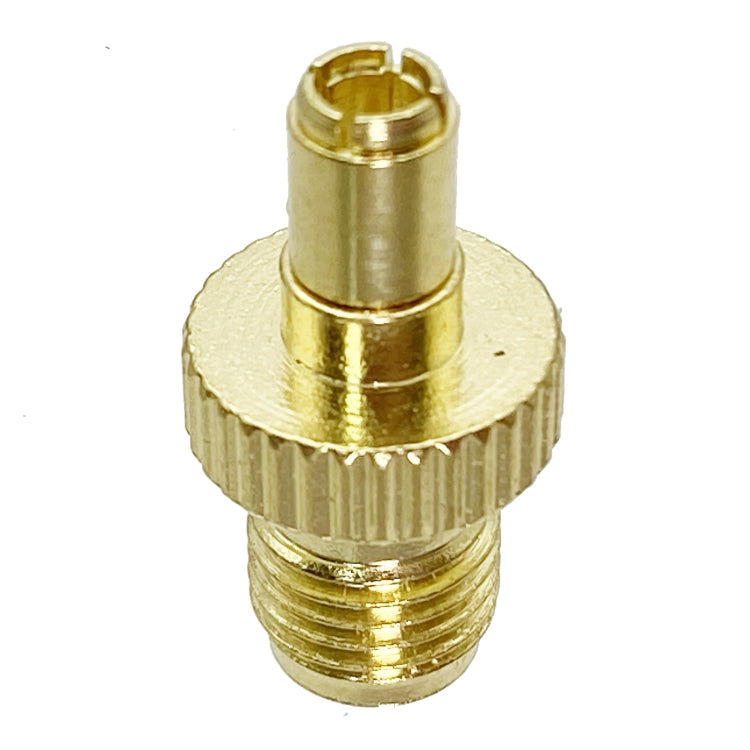 Gold SMA female to TS9 male coax adapter end with threaded coupling and center opening