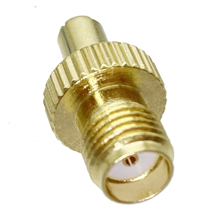 Gold coax adapter with SMA female threaded section and TS9 male plug tip