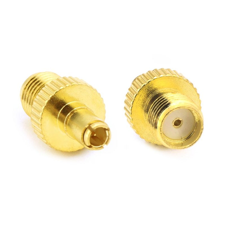 Gold SMA female to TS9 male adapter connectors, two-piece view with threaded ends