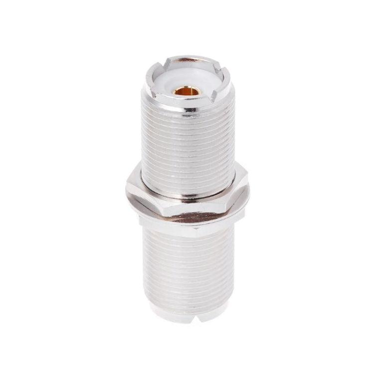 UHF female-to-female connector adapter with silver threaded housing and gold inner contact