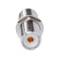 UHF female-to-female connector adapter, front view of gold center contact in white insert