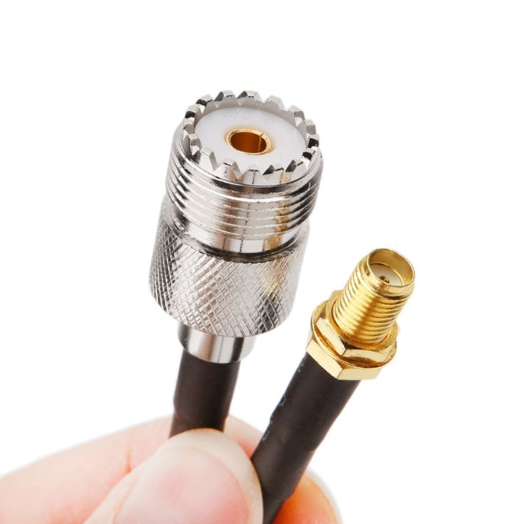 SMA female connector end on black coaxial cable with exposed threaded interface.