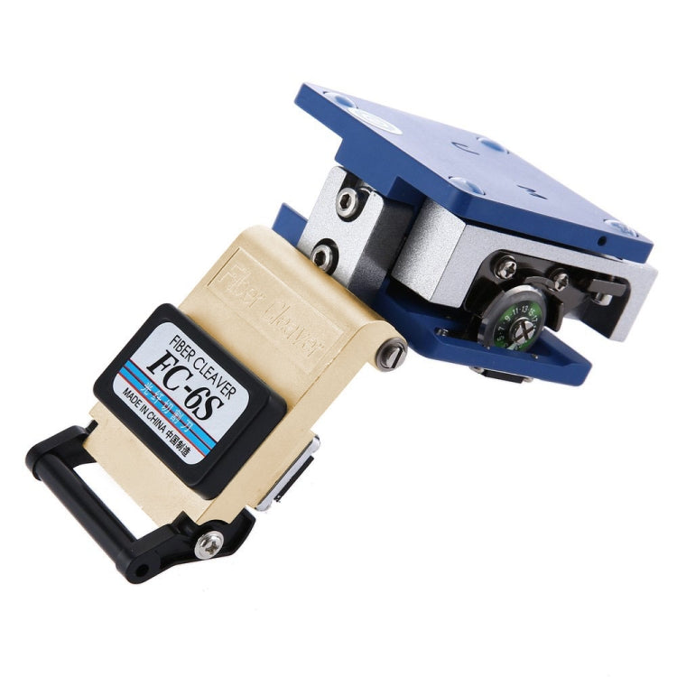 Optical fiber cleaver tool in angled view, beige label housing with blue top base