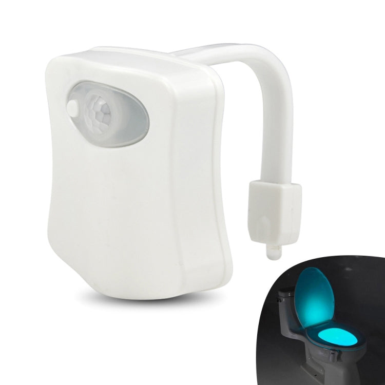 Motion-activated toilet nightlight with sensor window and blue LED glow