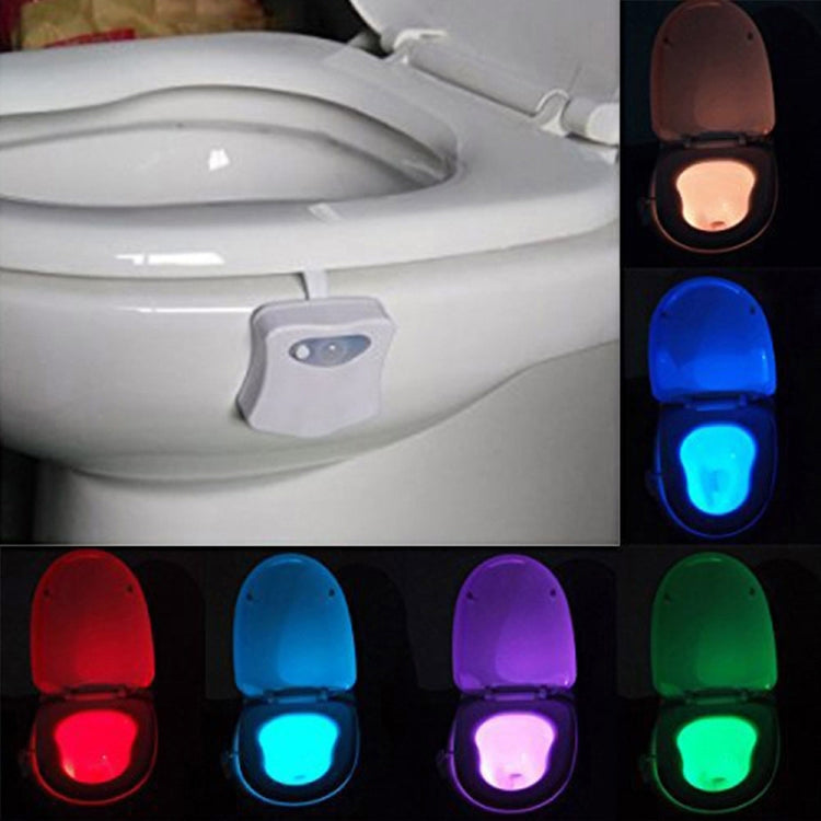 LED toilet nightlight under toilet lid with rotating color glow and motion sensor