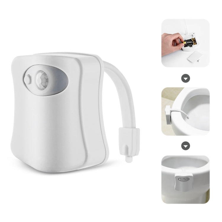 White motion-activated LED toilet nightlight with plug-in power adapter and sensor