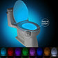 Blue glow LED toilet nightlight on toilet seat with motion-activated light