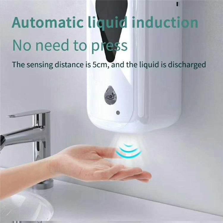 Touchless liquid dispenser with hand triggering infrared sensor at base