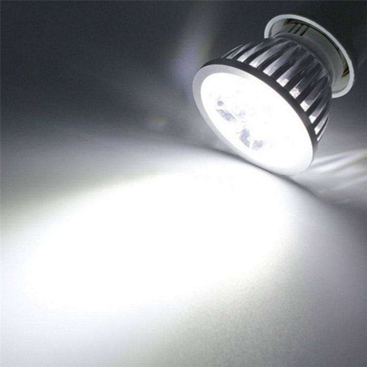 E27 LED spotlight emitting bright white light from recessed head
