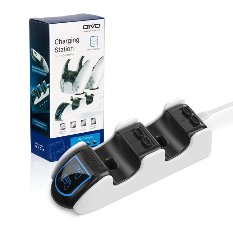 Dual PS5 controller charging dock with OIVO box packaging in the background.