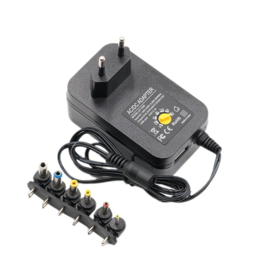 Black AC/DC adjustable power adapter with EU plug and multi-tip connector set