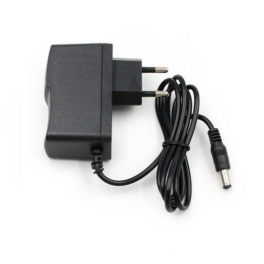 Black AC to DC power adapter with EU plug and 5.5mm barrel connector cable