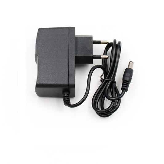 Black AC to DC charger adapter with two-prong plug and DC barrel output connector