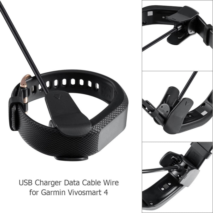 Fitness tracker charging cradle with cable connector, black clip and wristband