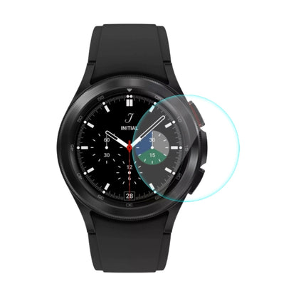 Black smartwatch with curved tempered glass screen protector applied over watch face