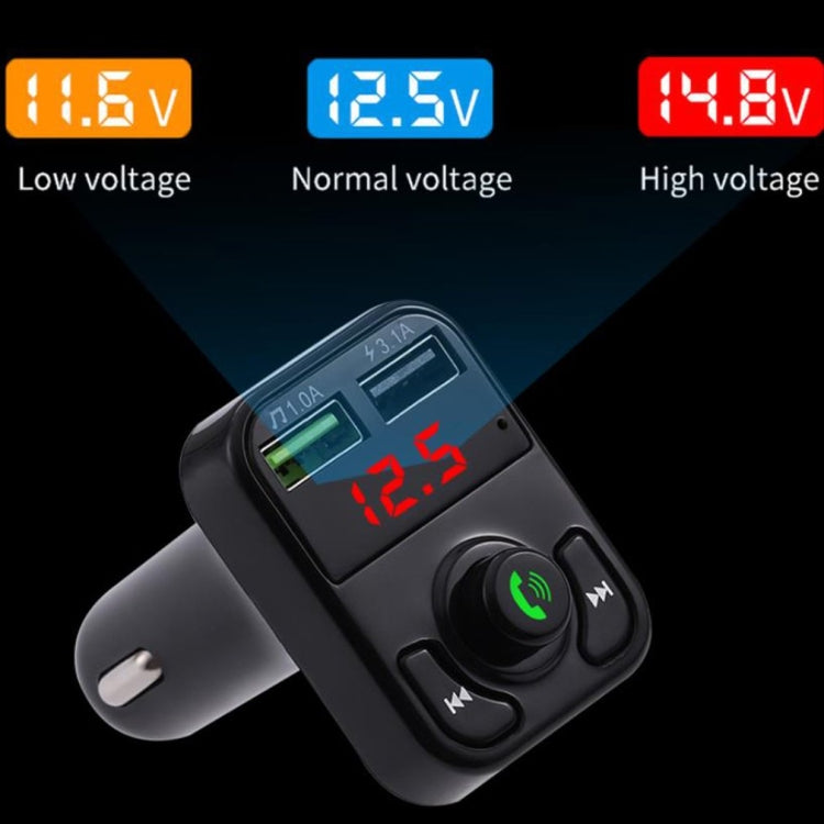 Black car hands-free wireless audio receiver showing red voltage reading on LCD
