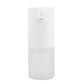 Automatic foam soap dispenser with ribbed white back panel and small dispensing outlet