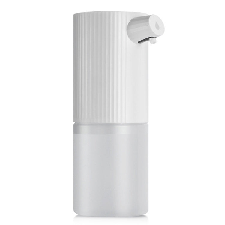 Automatic foam soap dispenser in white with ribbed top and side-mounted pump spout