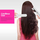 Cordless hair straightener in use on long dark hair, white and silver tool