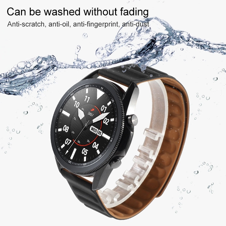 Silicone magnetic watch strap on smartwatch, black silicone band with brown underside, 42mm.