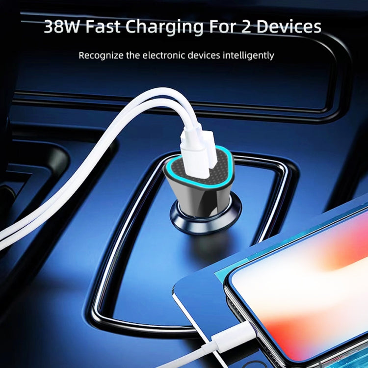 Black car USB-C charger mounted near dashboard with cable connected