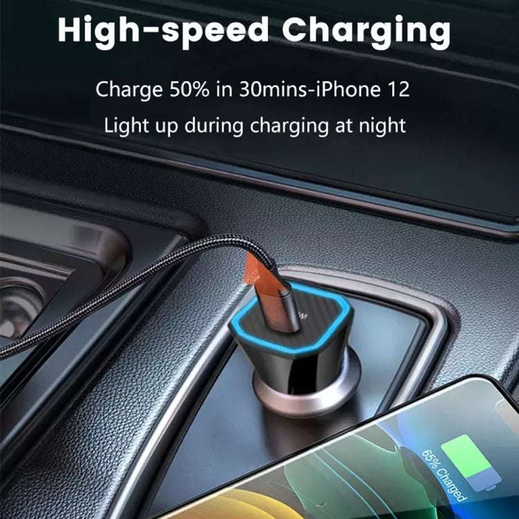 Black car USB-C PD charger plugged into car dashboard, visible charging port tip