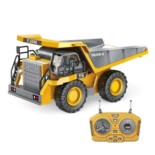 Yellow and gray remote control dump truck with open cargo bed and large tread tires