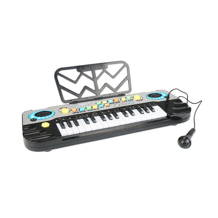Kids electronic keyboard piano with 32 keys, blue speaker pads, and microphone included